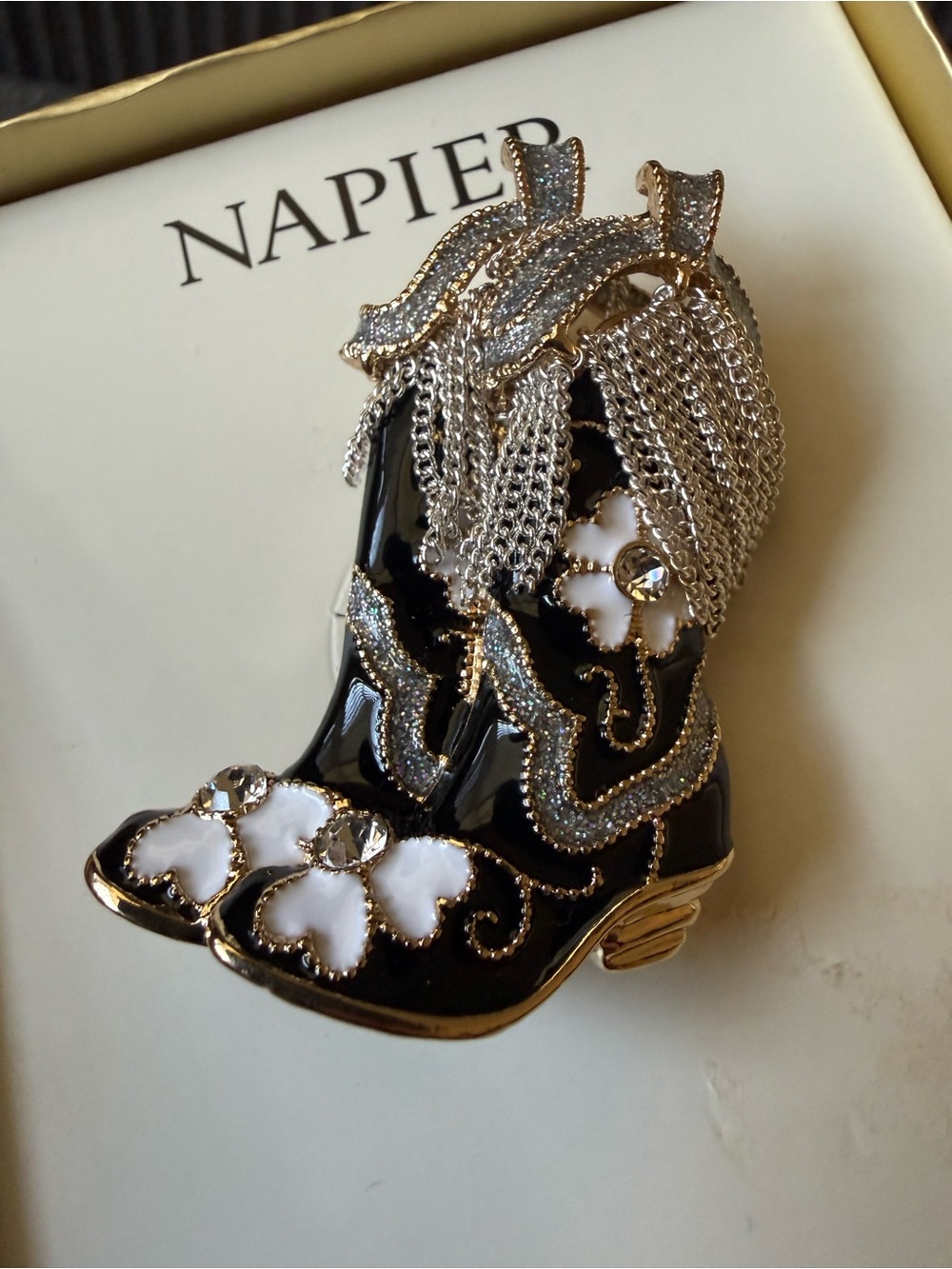 Napier Black, White & Gold Tone Enamel Western Boot Brooch with Silver Tassels